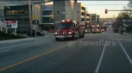 Police and fire crews blare sirens in support of health workers in Canada