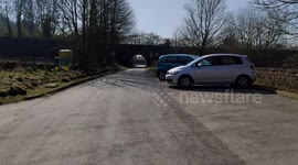 2 cars parked outside the closed carpark at Black Rocks thought to be walkers enjoying the Derbyshire Dales during the Cotonavirus COVID-19 restrictions