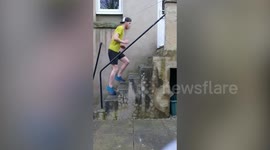 UK fitness enthusiast scales height of Welsh mountain by running up and down steps in his garden