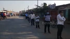 Indian residents queue to buy meat from butcher despite country's lockdown