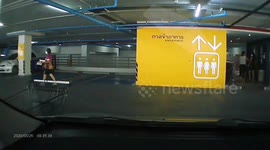 Thai woman caught using foot to push lift button amid COVID-19 pandemic