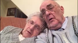 Adorable UK couple perform version of 'We’ll Meet Again' from their sofa during quarantine