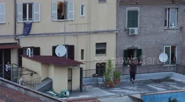 People around Italy take to their balconies to spread music amid coronavirus lockdown
