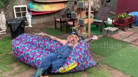 'Chicken King on skateboard' Quarantined man in California recreates 'Tiger King' riding a board with his chickens