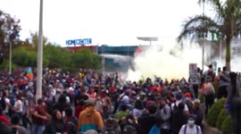 People ripping off tear gas from special forces