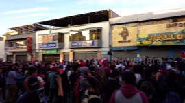 People protesting in the streets with saucepans, screams and songs