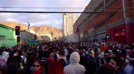 People protesting in the streets with saucepans, screams and songs