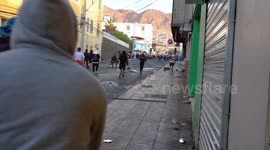 Small civil war in Chile, people fighting each other, one side wants to steal the super market and another defends it, part 1/8