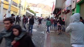 Small civil war in Chile, people fighting each other, one side wants to steal the super market and another defends it, part 3/8