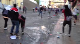 Small civil war in Chile, people fighting each other, one side wants to steal the super market and another defends it, part 4/8