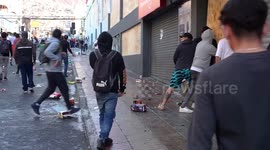 Small civil war in Chile, people fighting each other, one side wants to steal the super market and another defends it, part 6/8