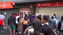 Small civil war in Chile, people fighting each other, one side wants to steal the super market and another defends it, part 7/8