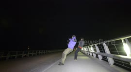 Swedish locals attempt to stand upright in hurricane-force winds