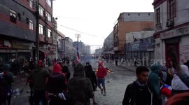 Police attacking protesters with tear gas