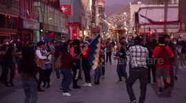 People protesting in the streets with saucepans, screams and songs