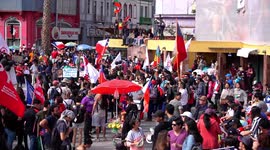 People gathered protesting in the main square of the city