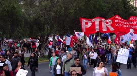 People protesting in the streets with saucepans, screams and songs