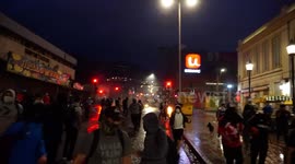 Confrontation between protesters and police after the march