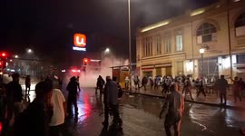 Confrontation between protesters and police after the march