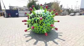 Indian man drives around in 'corona car' to encourage people to stay indoors