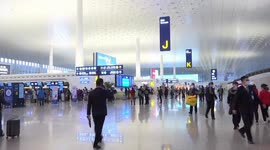 Passengers travel with QR code at China’s Wuhan airport after lockdown is lifted