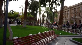 People protesting in the streets with saucepans, screams and songs