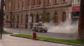 Protesters facing special forces in the main square are gassed