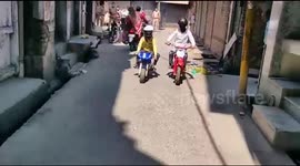 Two Children on Pocket Bikes in Uttar Pradesh Breach COVID-19 Lockdown to Donate for Welfare
