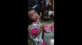 Cute And Cool Three Year Old Girl Doing Her Makeup