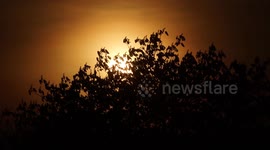 Sun sets on one of the warmest days of the year so far, Derbyshire, UK