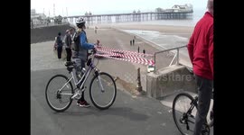 joy rider crashes through barriers and lands on blackpool promenade