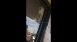 New Zealand husband with undies on his head offers his wife some mask options to pick up the groceries while in lockdown!