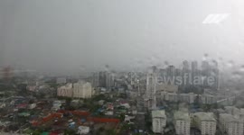 Time-lapse footage shows summer storm hitting Bangkok with heavy rain