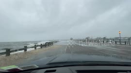 Long Island local drives along coastal road as strong and damaging winds batter his car near New York