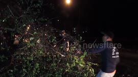 Power lines town down after summer storms hit northern Thailand