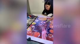 Canadian sisters put down TV screen to fake having Korean barbecue during COVID-19 lockdown