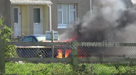 Car Fire in Helston Cornwall smokeand flames engulfing a motor vehicle