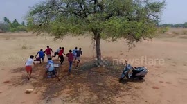 Groups of teens in India flee after being spotted by police drones during COVID-19 lockdown