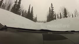 Swedish driver braves snow drifts and up to 2 Metres of snow during spring blizzard