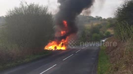 Range Rover engulfed in flames on UK country lane