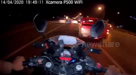Police helmet cam shows dramatic chase with 'illegal motorcycle drag racers'