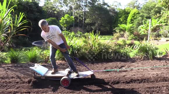 Australian Dad invents awesome wakeboarding plough to prepare the soil for his veg patch