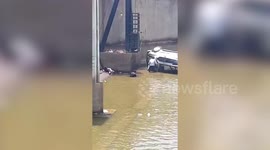 Woman 'having a driving lesson with her husband' crashes into river in Cambodia