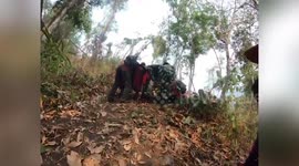 Stricken fireman rescued after breaking his leg while battling forest fires