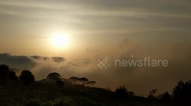 Lebanese valley is invaded by cloud inversion in this timelapse footage