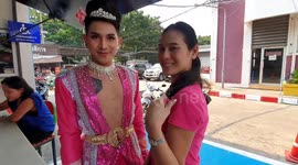 Male wedding shop staff wear colourful dresses to deliver food during coronavirus shut down