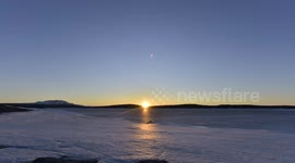 Stunning time-lapse of sunset over the snow covered frozen wastelands of northern Sweden