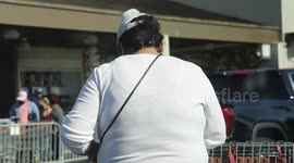 Masked women reads list synchronize shopper mask coronavirus line