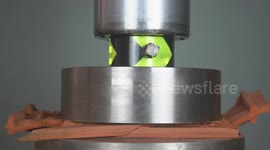 Hydraulic press SMASHES household objects in satisfying clip