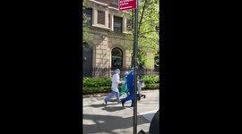 Health care workers seen running with equipment to Central Park field hospital